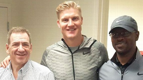 McCown, flanked by William Lambos (left) and Tommy Shavers (right) after a game last season. Both work closely with McCown in his cognitive training. Courtesy Josh McCown